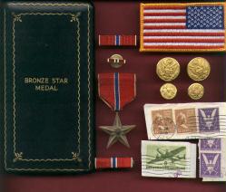 Genuine WWII Bronze Star medal in old style case with ribbon bar and lapel pin, Invasion money etc.