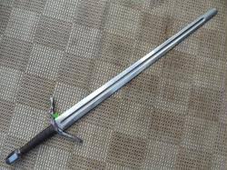 Broadsword, upturned handle with twist. faceted Pommel
